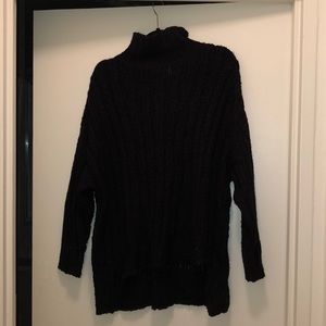 Long black knit sweater